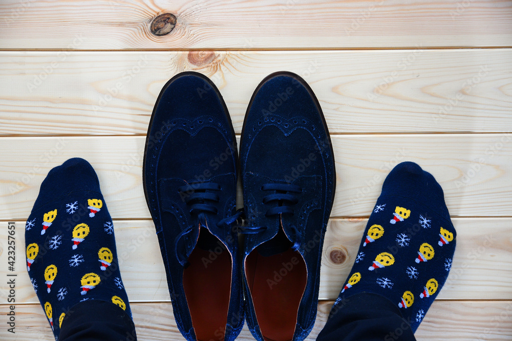 Oxfords with socks on the wooden floor