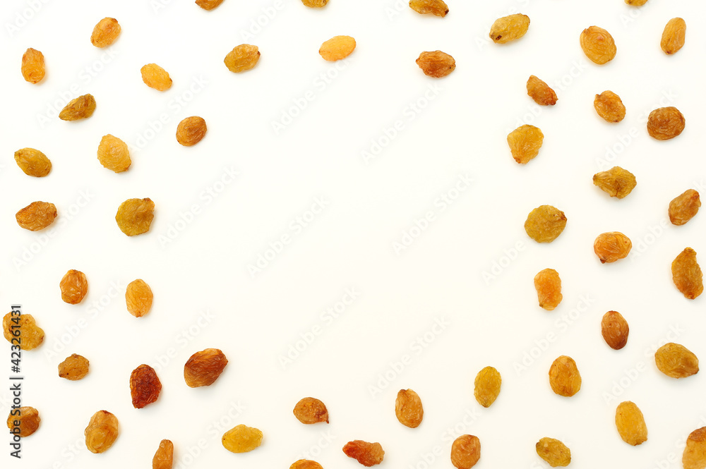 Dried grapes. Raisins on a white background. Top view Dried grapes. Raisins on a white background. Top view