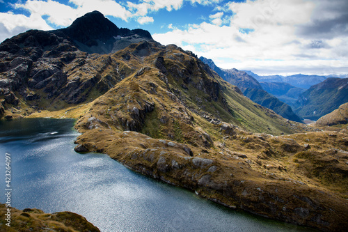 A rocky trail above Lake Harris on day two of the Routeburn Trak (designated as a Great Walk category) in New Zealand's South Island near the town of Glenorchy.