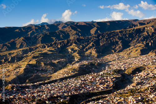 The sky-high capital city of La Paz, Bolivia  lies at 11,500' (asl) in a deep canyon below the Andes Mountains. photo