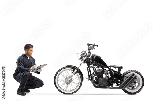 Bike repairman checking a chopper motorbike