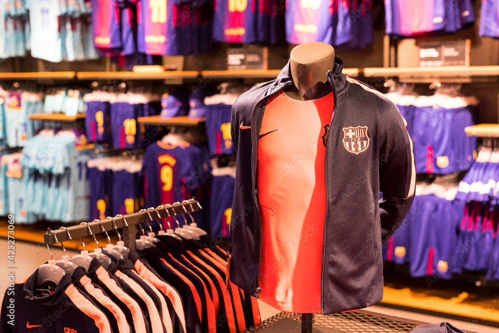 BARCELONA, SPAIN - 12 JANUARY 2018: Official Store FC Barcelona , clothing  and footwear team of souvenirs and paraphernalia for fans of the team and  visitors of the stadium. Stock Photo | Adobe Stock