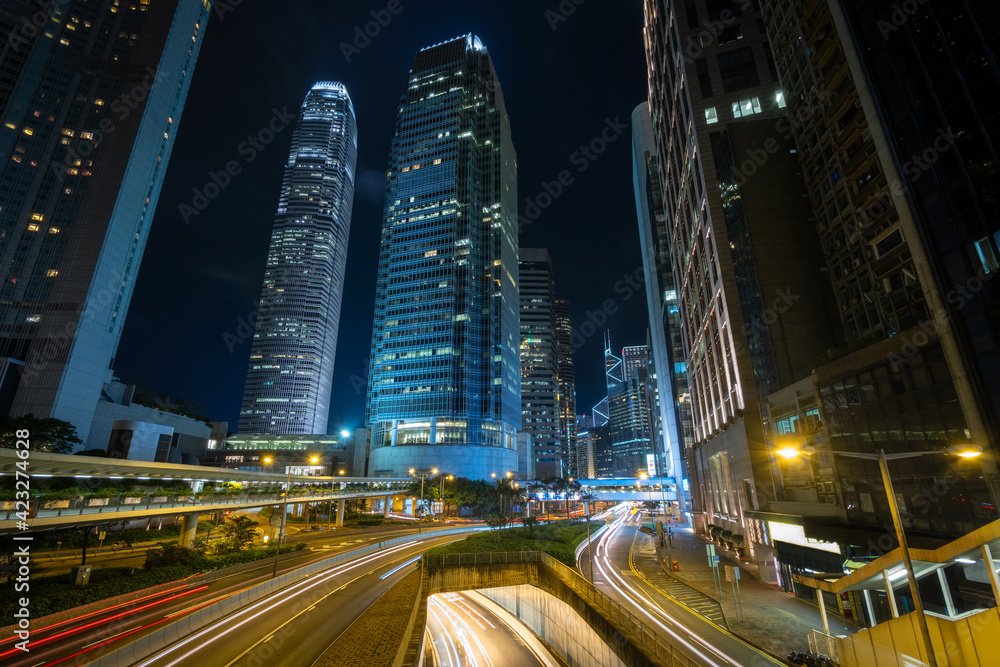 Night view of modern high rise buildings in the financial district of Hong Kong, China.