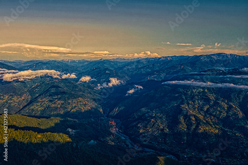Clouds above the mountains, beautiful panoramic view © Dmitrii