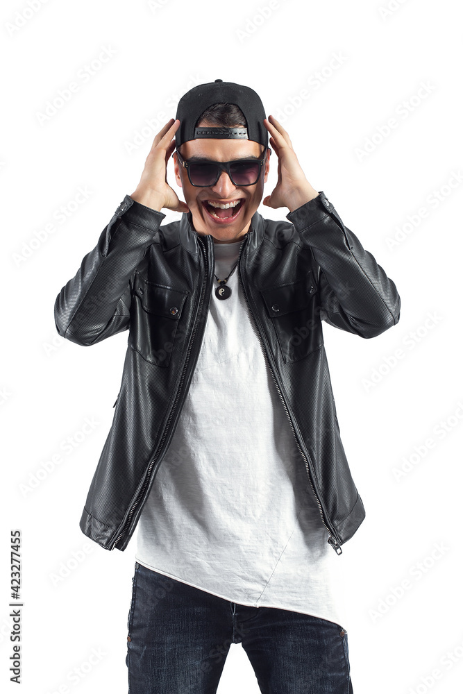 Fashion portrait of young handsome man. Cool rap dj, electro house music, deep house, mens fashion style,black style, leather jacket, rap, cat, b-boy, freestyler, singer, talented rap singer Fashion portrait of young handsome man. Cool rap dj, electro house music, deep house, mens fashion style,black style, leather jacket, rap, cat, b-boy, freestyler, singer, talented rap singer
