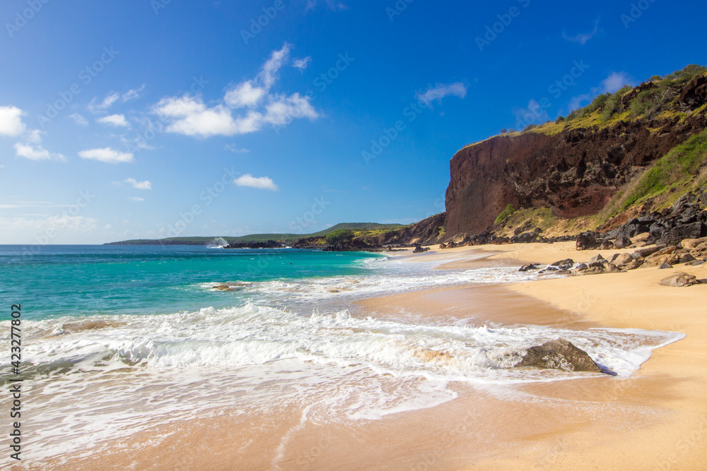 Coastline of beautiful sandy beach, untouched place with no people on remote Molokai island with turquoise waters Coastline of beautiful sandy beach, untouched place with no people on remote Molokai island with turquoise waters
