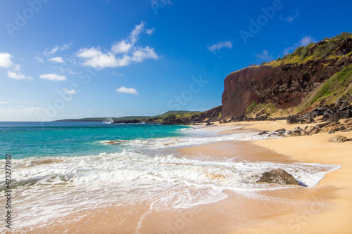 Coastline of beautiful sandy beach, untouched place with no people on remote Molokai island with turquoise waters