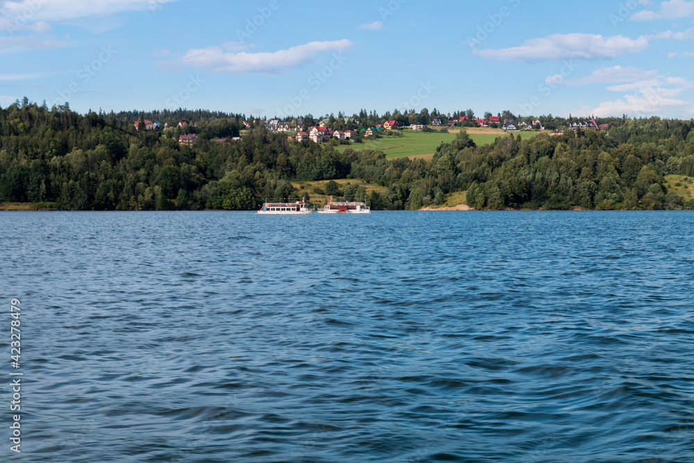 two tourist ships passing through the lake two tourist ships passing through the lake