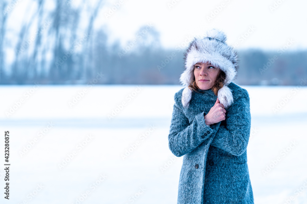 young woman in winter clothes in nature young woman in winter clothes in nature