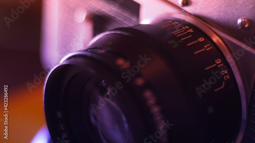 Closeup Shot Of Lens Of Vintage Film Camera photo