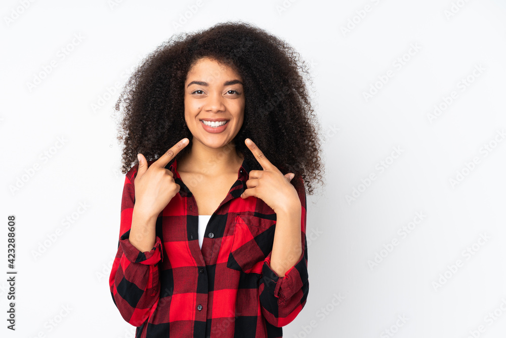 Young african american woman over isolated background giving a thumbs up gesture Young african american woman over isolated background giving a thumbs up gesture