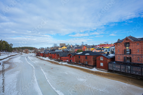 Porvoo, Finland, March 3, 2021. Winter river in Porvoo and surrounding architecture along the banks