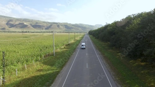 car road mountain field wheat