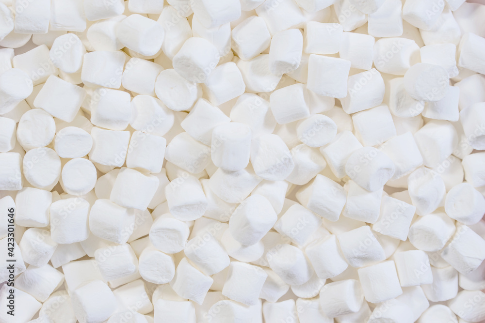 White marshmallow candy pattern food background. Top view. Flat lay. sweet food. Winter food background concept. White marshmallow candy pattern food background. Top view. Flat lay. sweet food. Winter food background concept.
