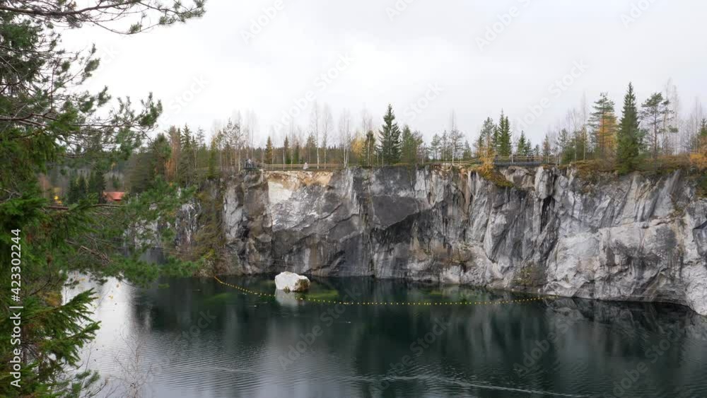 Landmark of Russia. Mountain park Ruskeala at autumn season. Marble canyon in Sortavala region of Republic of Karelia. Landmark of Russia. Mountain park Ruskeala at autumn season. Marble canyon in Sortavala region of Republic of Karelia.