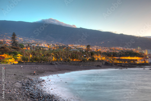 Sunset over Playa del castillo at Puerto de la Cruz, Canary Islands, Spain photo