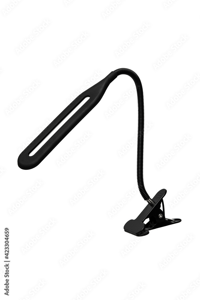 LED lamp on a flexible leg with a clothespin for attaching to a table. Table lamp isolate on a white back LED lamp on a flexible leg with a clothespin for attaching to a table. Table lamp isolate on a white back