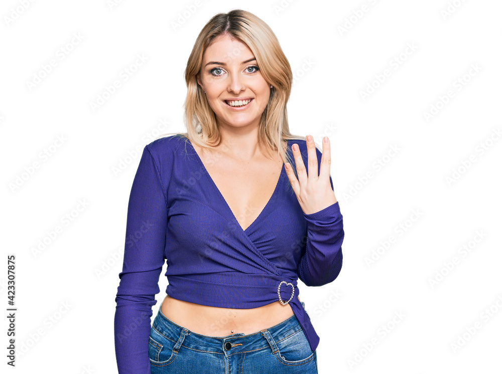 Fototapeta premium Young caucasian woman wearing casual clothes showing and pointing up with fingers number four while smiling confident and happy.