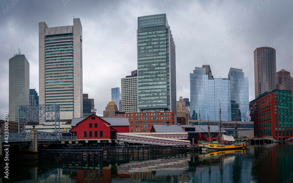 Boston City Skyline and Water Reflections over the Boston Harbor. Boston City Skyline and Water Reflections over the Boston Harbor.