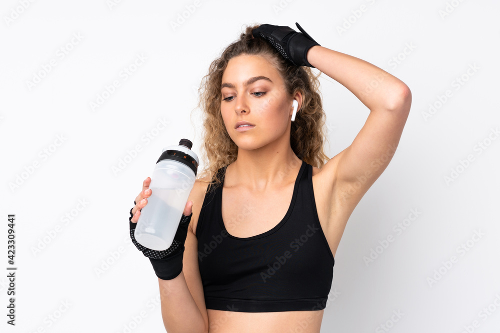 Young sport woman isolated on white background with sports water bottle Young sport woman isolated on white background with sports water bottle