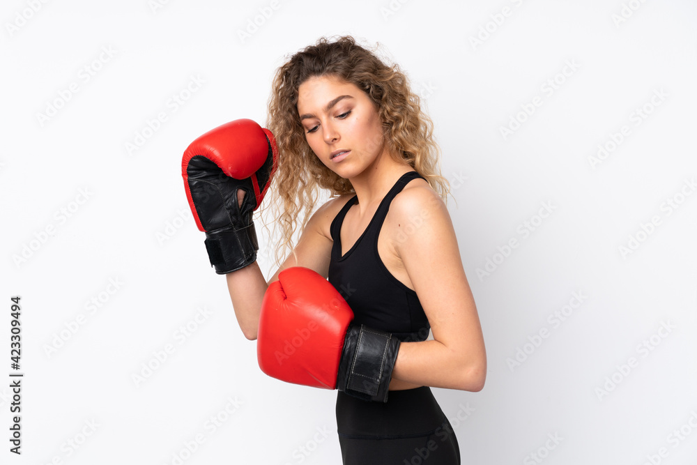 Young sport woman isolated on white background with boxing gloves