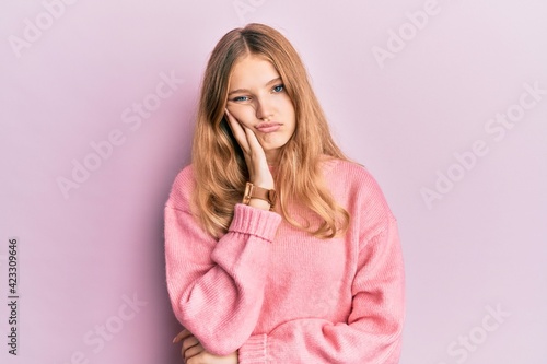 Beautiful young caucasian girl wearing casual clothes thinking looking tired and bored with depression problems with crossed arms.