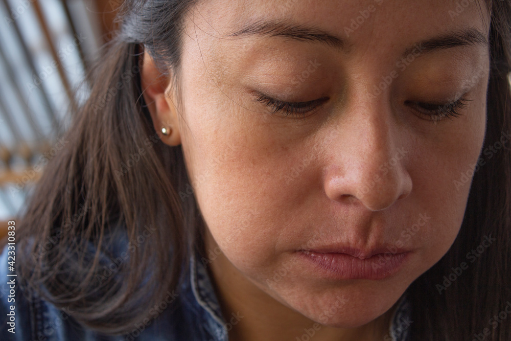 detail of the face of a young woman eating detail of the face of a young woman eating