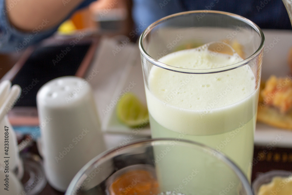 lemonade in a glass tumbler on a restaurant table lemonade in a glass tumbler on a restaurant table