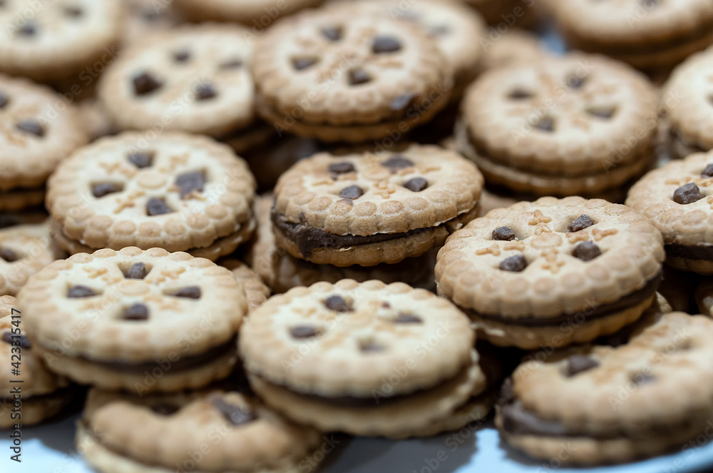 Baked cookies filled with chocolate cream Baked cookies filled with chocolate cream