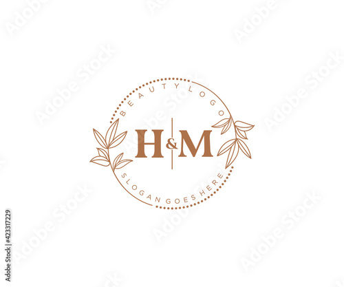 initial HM letters Beautiful floral feminine editable premade monoline logo suitable for spa salon skin hair beauty boutique and cosmetic company.