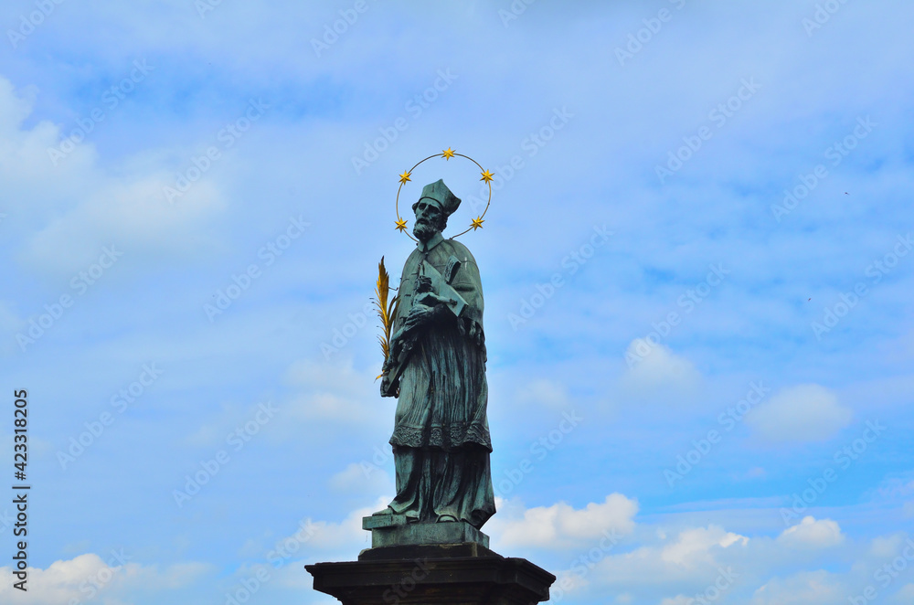 Statue of Saint John of Nepomuk on Charles Bridge in Prague, Czechia