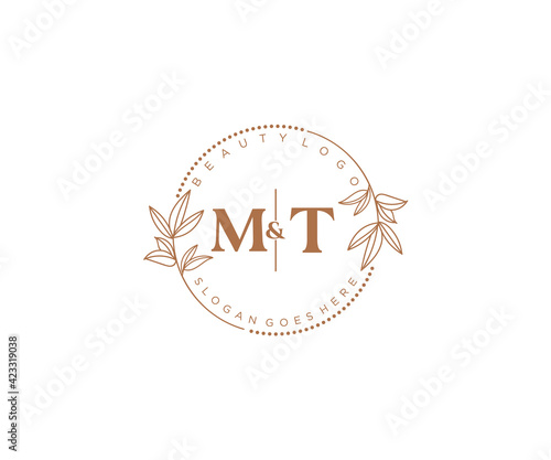 initial MT letters Beautiful floral feminine editable premade monoline logo suitable for spa salon skin hair beauty boutique and cosmetic company.