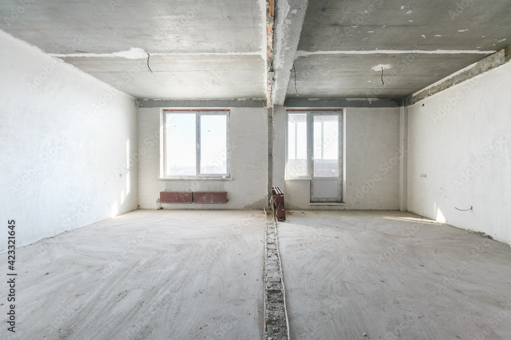 interior of the apartment without decoration in gray colors. rough finish interior of the apartment without decoration in gray colors. rough finish