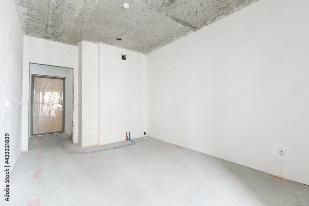 interior of the apartment without decoration in gray colors. rough finish interior of the apartment without decoration in gray colors. rough finish