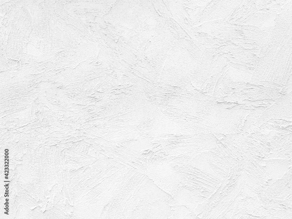ザラザラの質感のある白い壁の背景テクスチャー