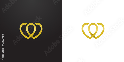 overlapping 2 hearts logo in gold black and white background - luxury line art design