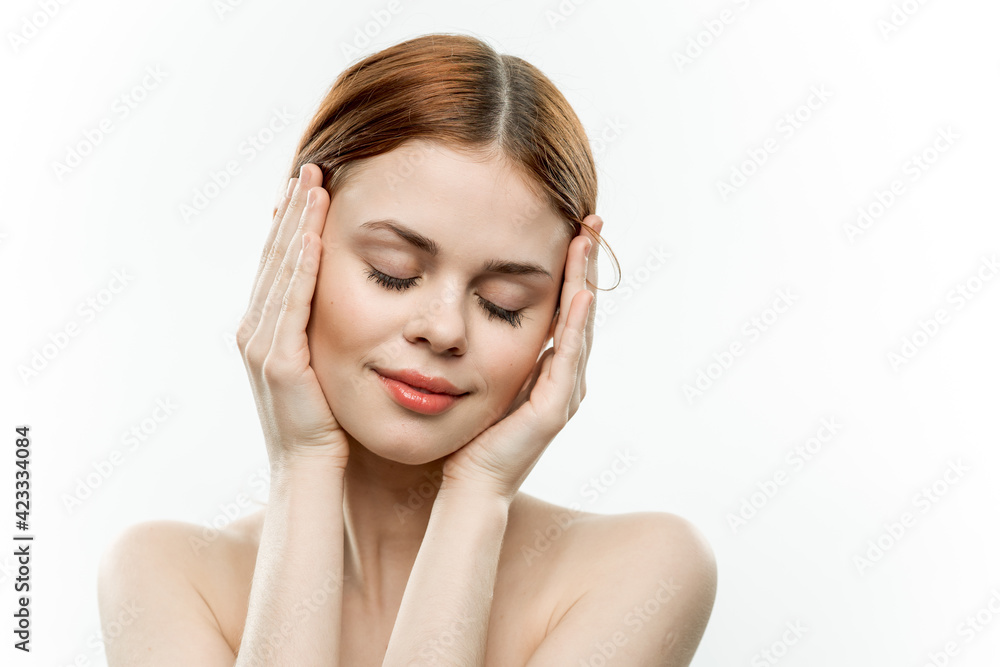 attractive woman holding face closed eyes charm naked shoulders attractive woman holding face closed eyes charm naked shoulders
