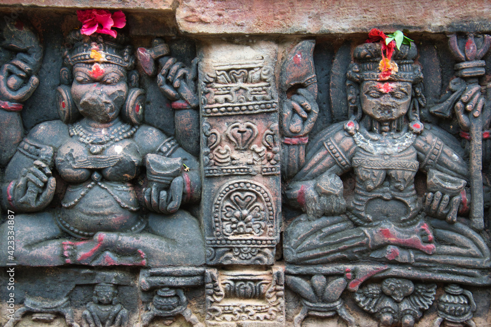 Decorations on the walls of temples in Bhunabeshwar in India