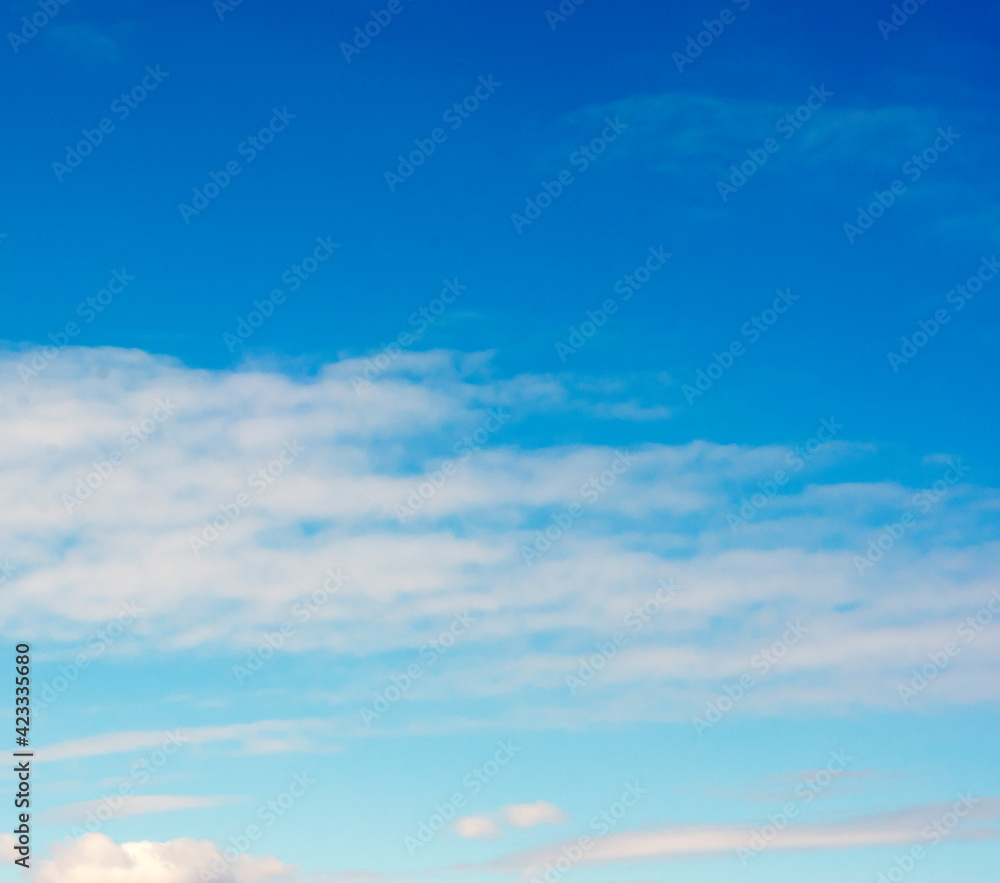 Blue sky and thin clouds background. Beautiful abstract background. Landscape. Blue sky and thin clouds background. Beautiful abstract background. Landscape.