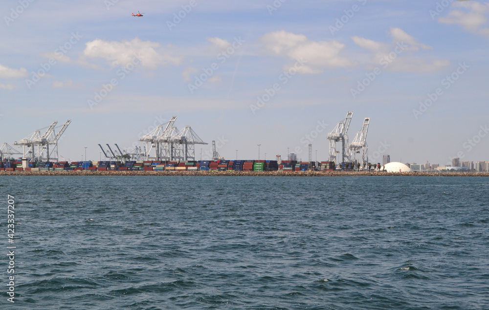 Long Beach shipping and container port with cranes loading cargo, USA Long Beach shipping and container port with cranes loading cargo, USA