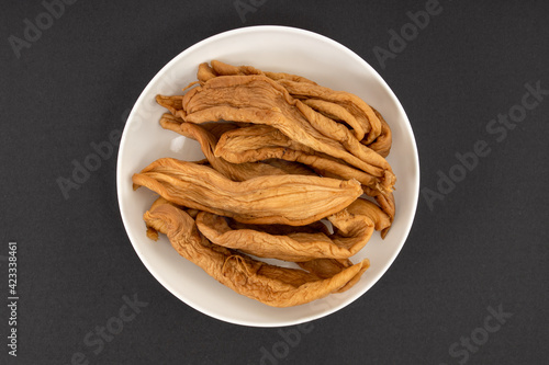 A dish of dried radishes photo