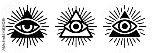 All seeing eye, illuminati symbol in triangle with light ray vector illustration.