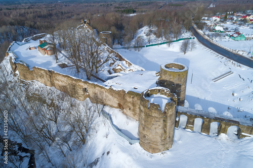 The ruins of the ancient Koporye  fortress close-up on a February day (aerial photography). Leningrad region, Russia photo