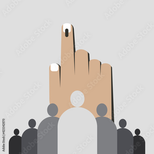 A group of people standing in front of a huge hand with electoral stain