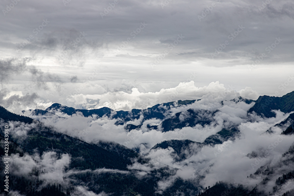 mesmerizing view of clouds in himalyan mountain range.