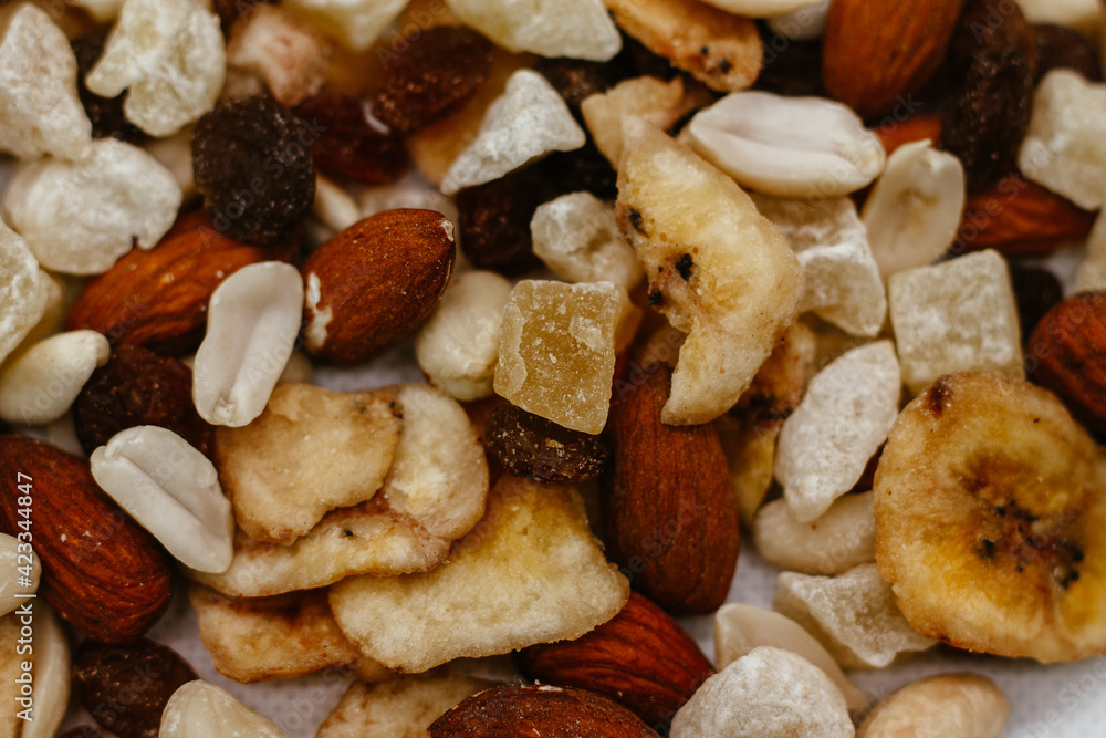 dried fruits and nuts
on a white background close-up dried fruits and nuts
on a white background close-up