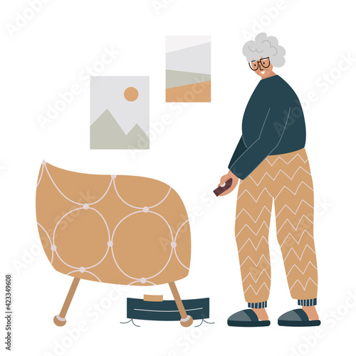 Old woman using a robot vacuum cleaner.
