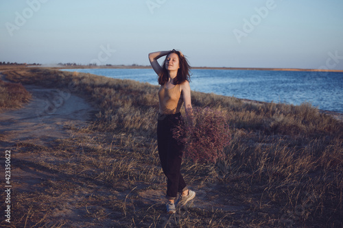 girl with a bouquet of flowers photo