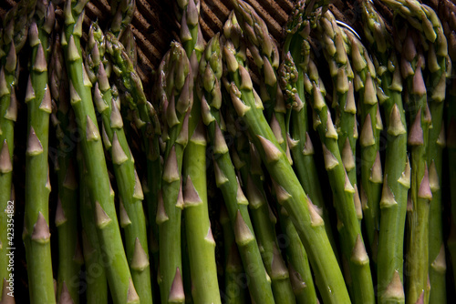 Fresh green asparagus on cooking pan