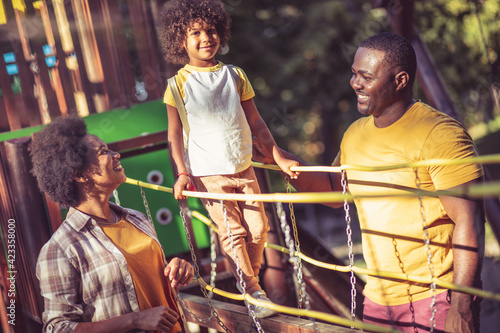 African American family having fun outdoors.